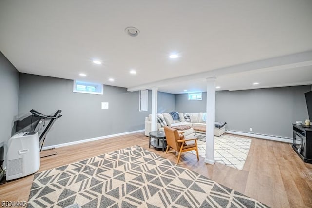 interior space with light hardwood / wood-style floors and baseboard heating