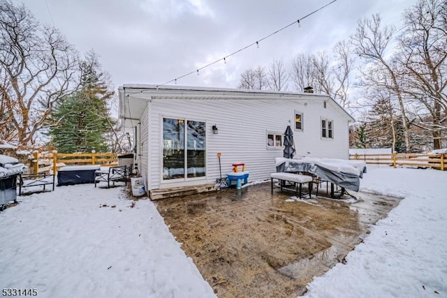 view of snow covered house