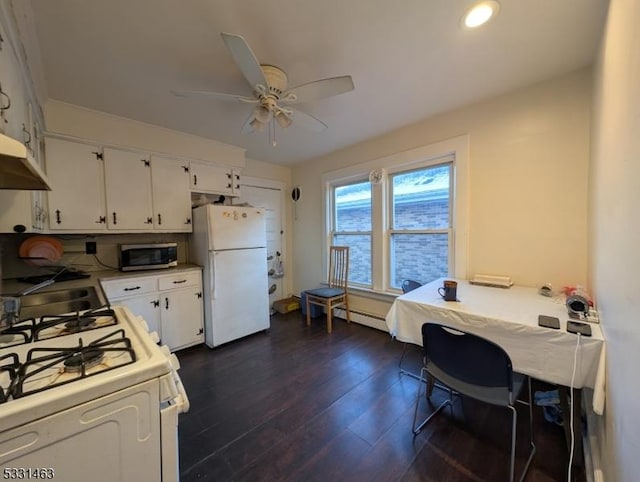 kitchen featuring white cabinetry, ceiling fan, baseboard heating, dark hardwood / wood-style flooring, and white appliances