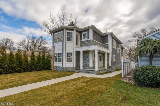 view of front of property with a front lawn