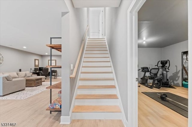 stairway with wood-type flooring