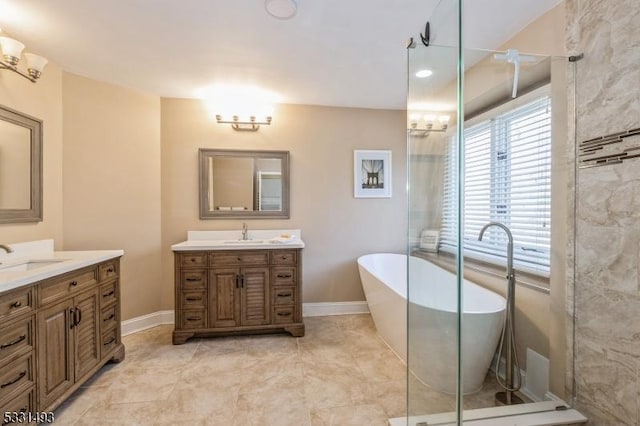 bathroom with vanity and independent shower and bath