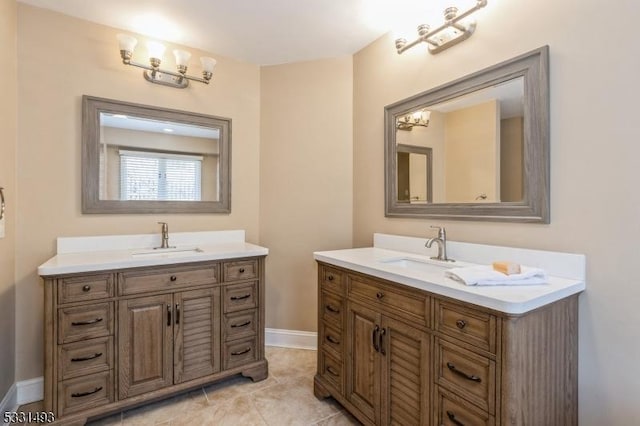 bathroom with tile patterned floors and vanity