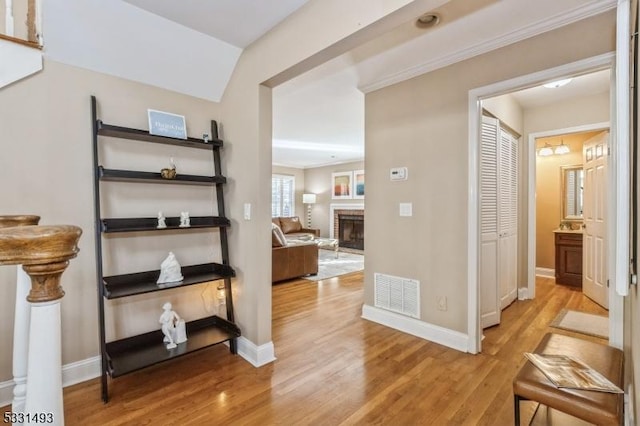 corridor featuring light hardwood / wood-style floors