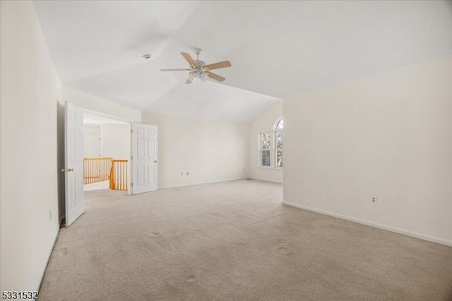 interior space featuring vaulted ceiling and ceiling fan