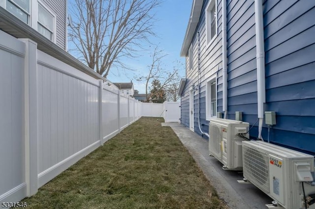 view of yard with ac unit