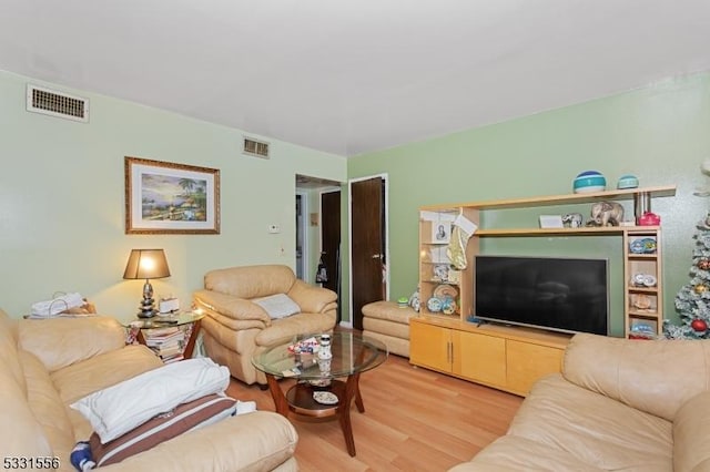 living room with hardwood / wood-style flooring