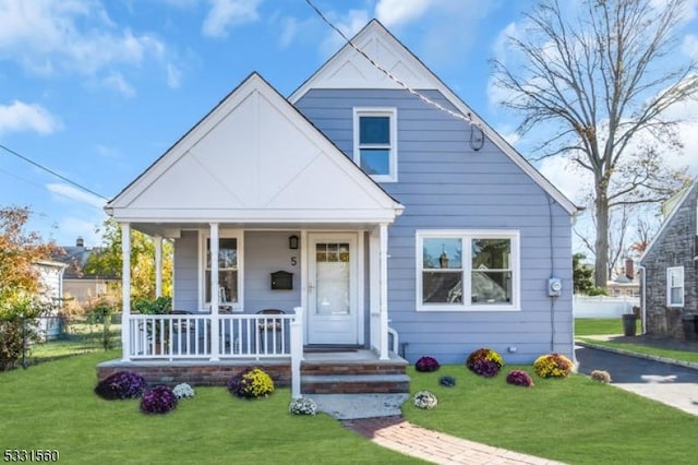 bungalow with a front lawn