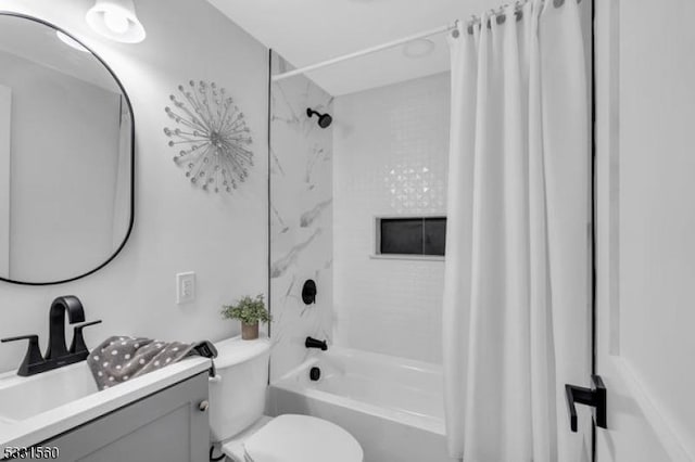 full bathroom featuring vanity, toilet, and shower / bath combo with shower curtain