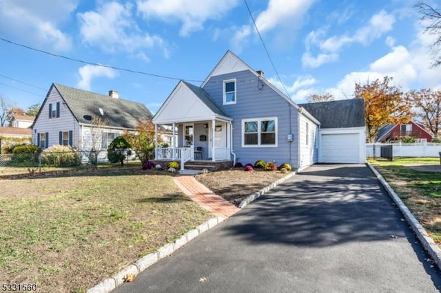 bungalow featuring a front yard