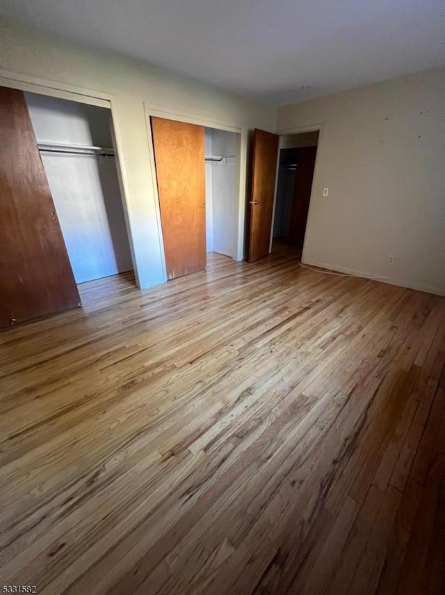 unfurnished bedroom featuring light hardwood / wood-style floors