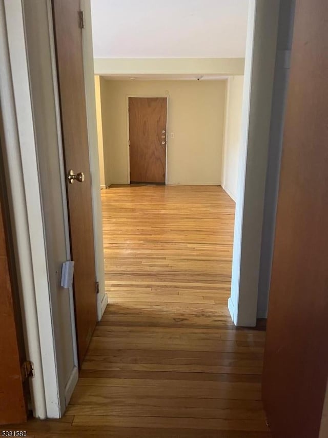 hallway featuring light wood-type flooring