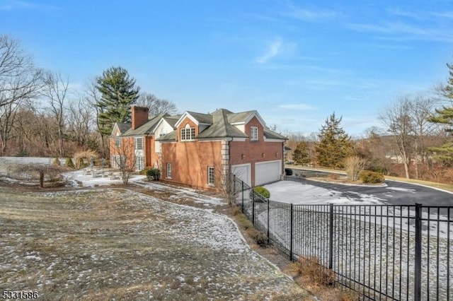 view of home's exterior with a garage