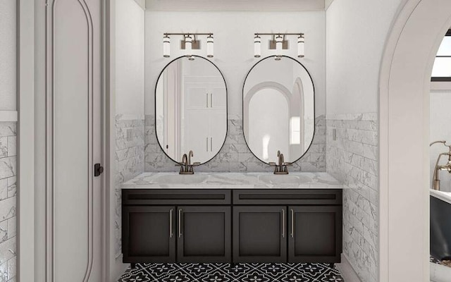 bathroom with vanity and tile walls