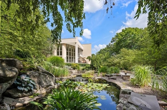 view of yard with a sunroom