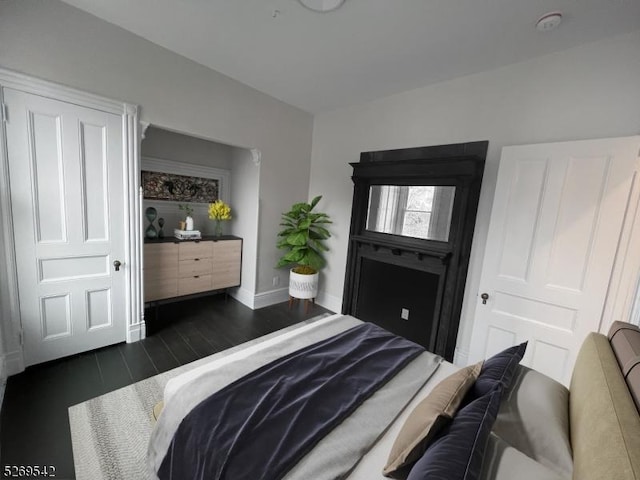 bedroom featuring dark hardwood / wood-style floors