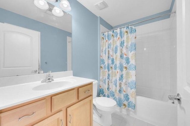 full bathroom with tile patterned floors, vanity, toilet, and shower / bathtub combination with curtain