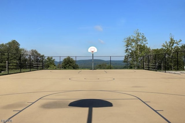 view of sport court featuring a mountain view