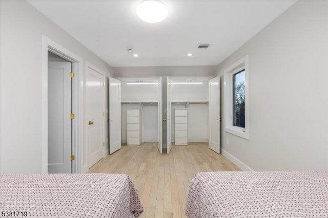 bedroom featuring light hardwood / wood-style floors