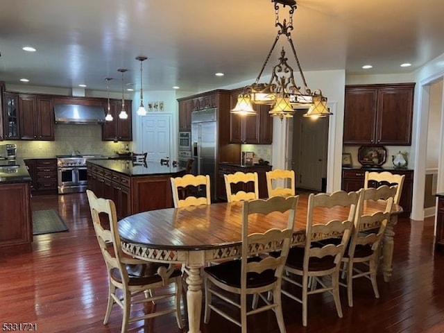 dining room featuring dark wood-type flooring