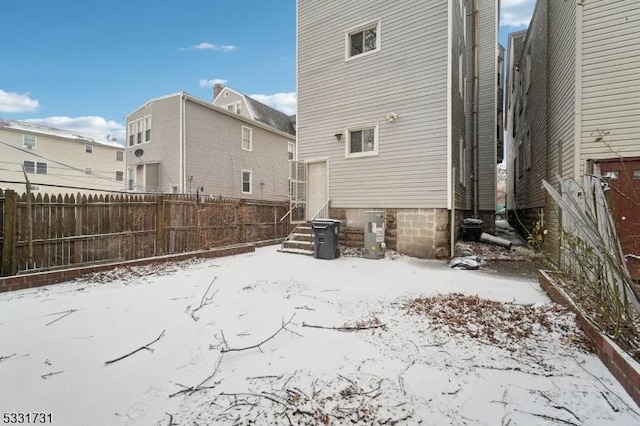 view of snow covered property