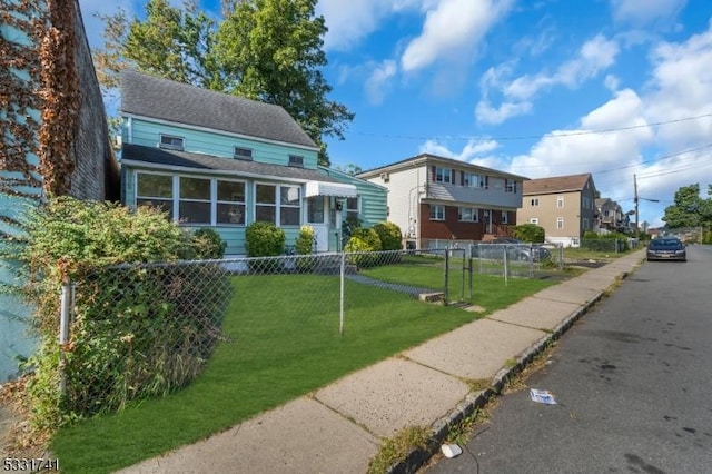 view of front of home with a front yard