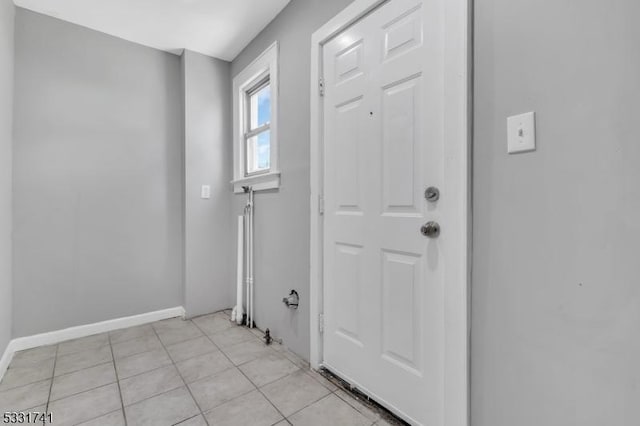 interior space with light tile patterned floors