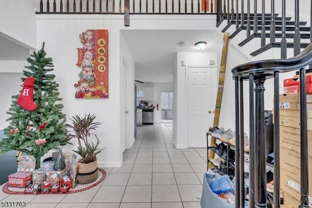 hallway featuring light tile patterned flooring