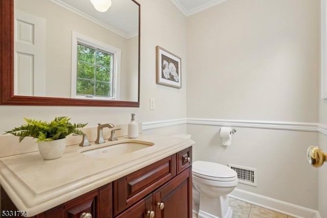 half bathroom featuring crown molding, vanity, toilet, tile patterned floors, and visible vents