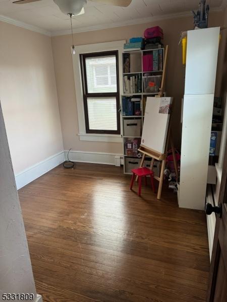 interior space with ceiling fan