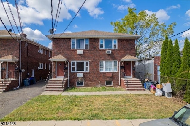 view of front of home with a front yard