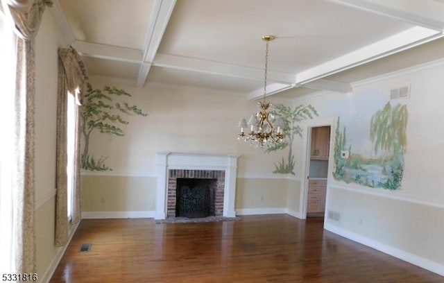 unfurnished living room featuring beam ceiling, dark hardwood / wood-style flooring, a brick fireplace, and coffered ceiling