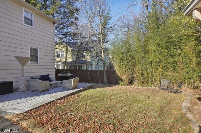 view of yard featuring a patio and outdoor lounge area