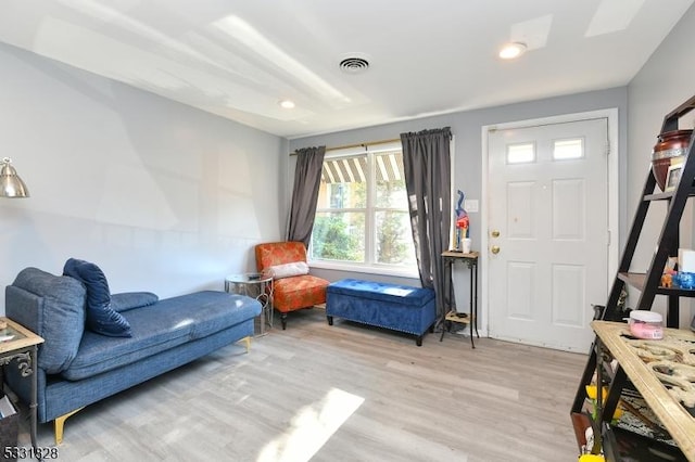 sitting room featuring light hardwood / wood-style flooring