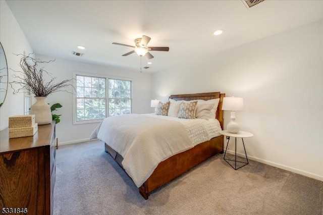 carpeted bedroom with ceiling fan