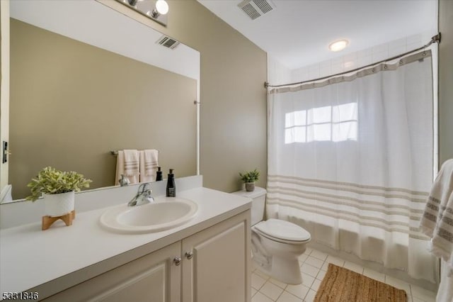 full bathroom with toilet, tile patterned flooring, vanity, and shower / bath combo with shower curtain