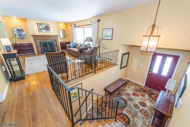 entryway with hardwood / wood-style floors