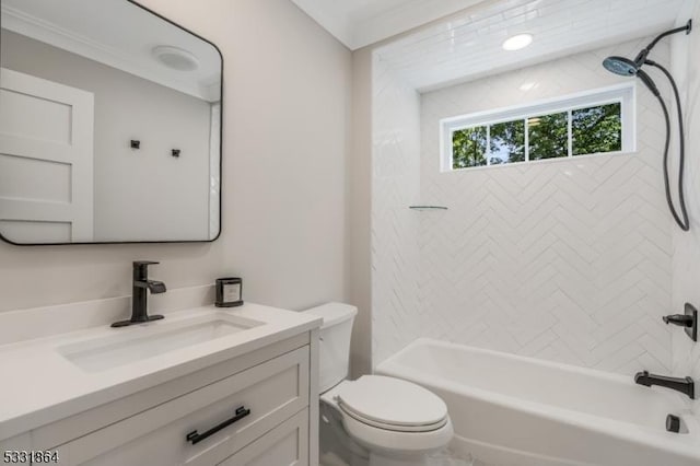 full bathroom with toilet, tiled shower / bath, and vanity