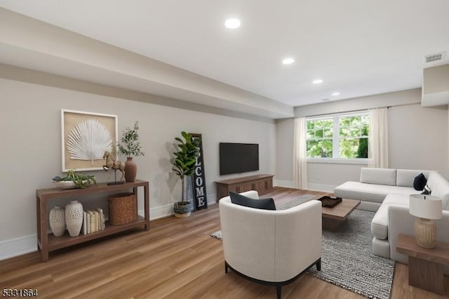 living room with hardwood / wood-style flooring