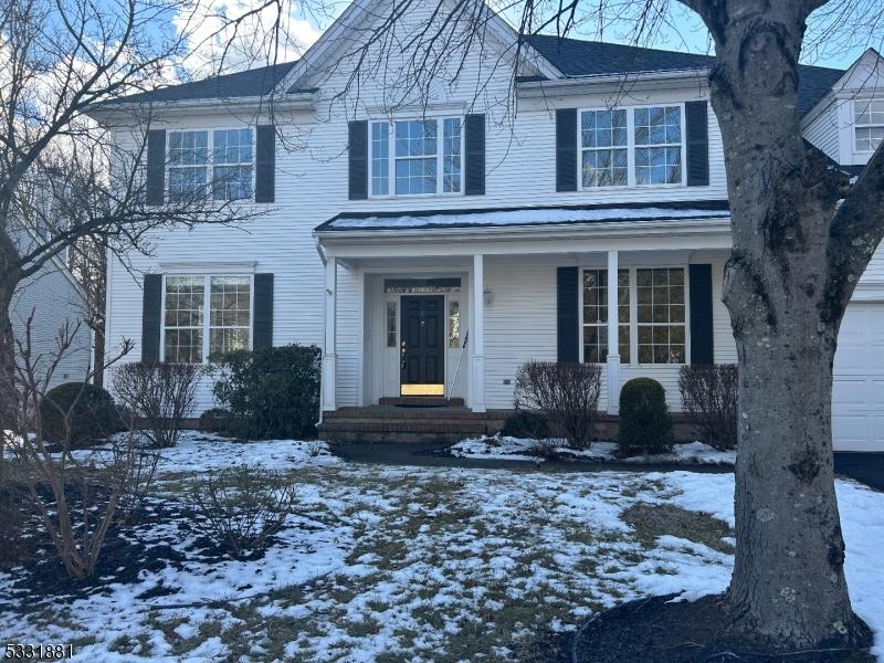 colonial house featuring a garage