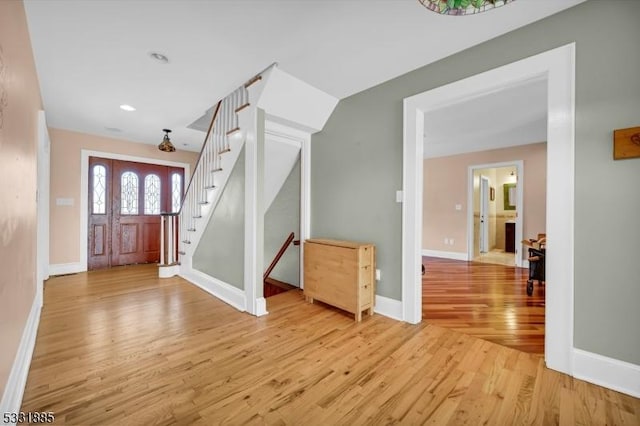 foyer with light wood-type flooring