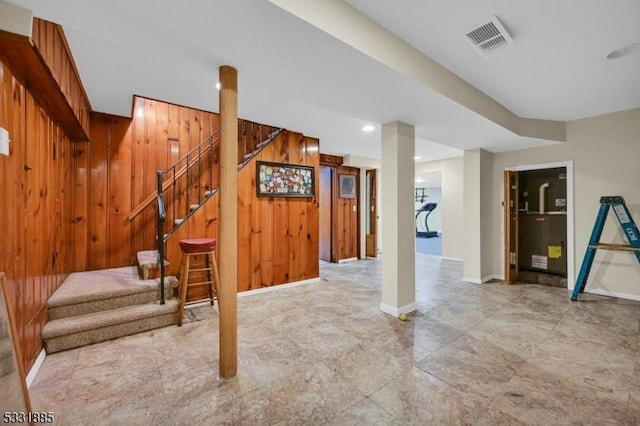 basement with wood walls