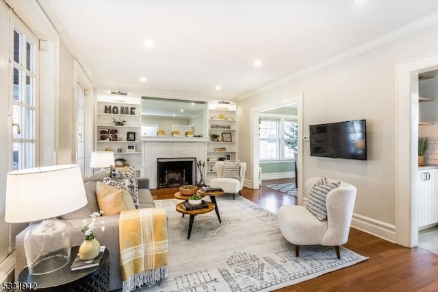 living room with ornamental molding and dark wood-type flooring