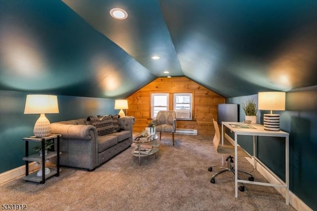 carpeted office featuring vaulted ceiling and wood walls