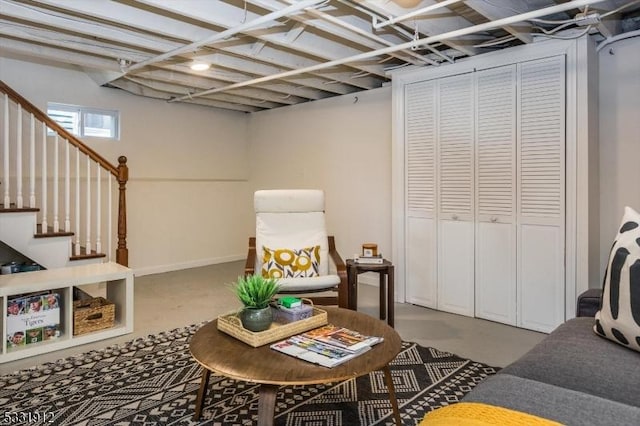 living room with concrete flooring