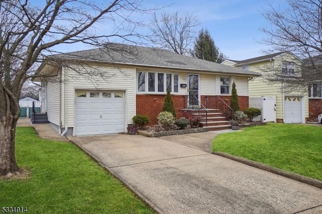 single story home featuring a garage and a front yard