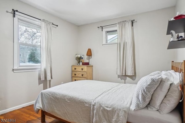 bedroom featuring wood-type flooring