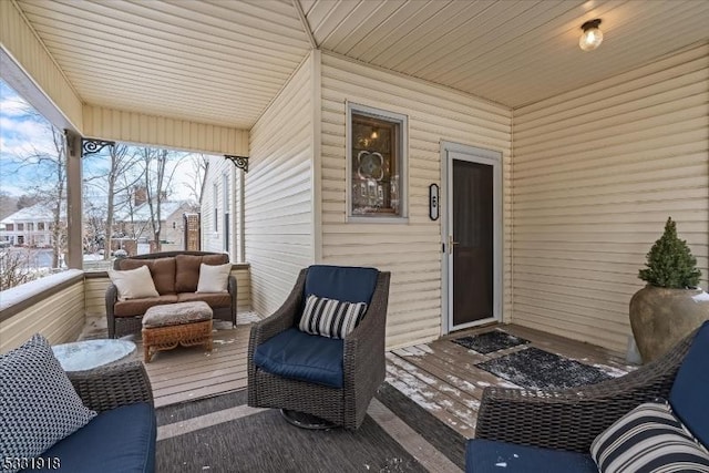 view of snow covered deck