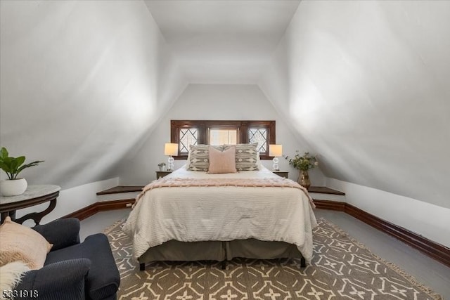 bedroom featuring vaulted ceiling