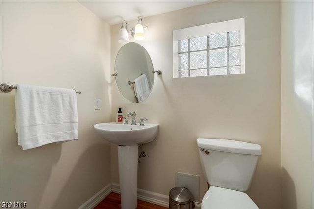 bathroom with sink and toilet